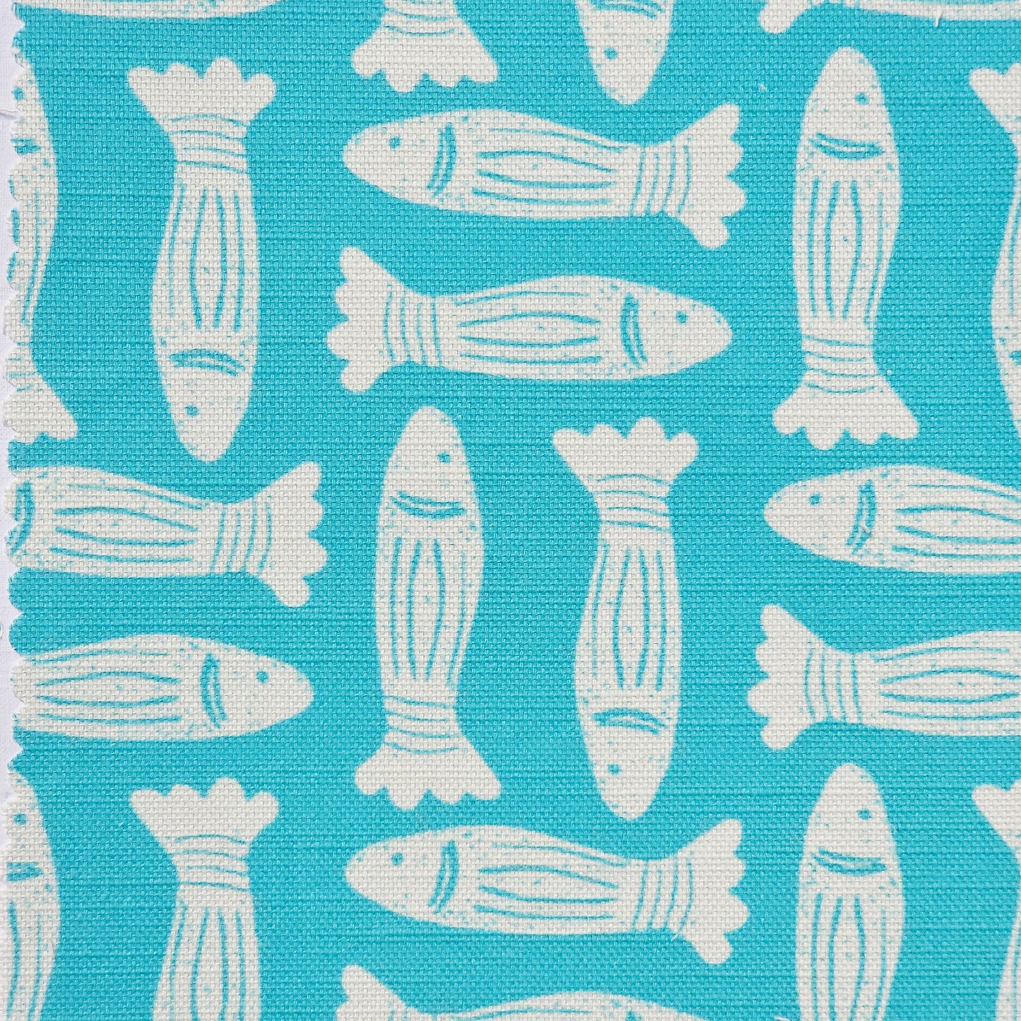 Zia Living Fishes fabric swatch lino print in teal with white fish