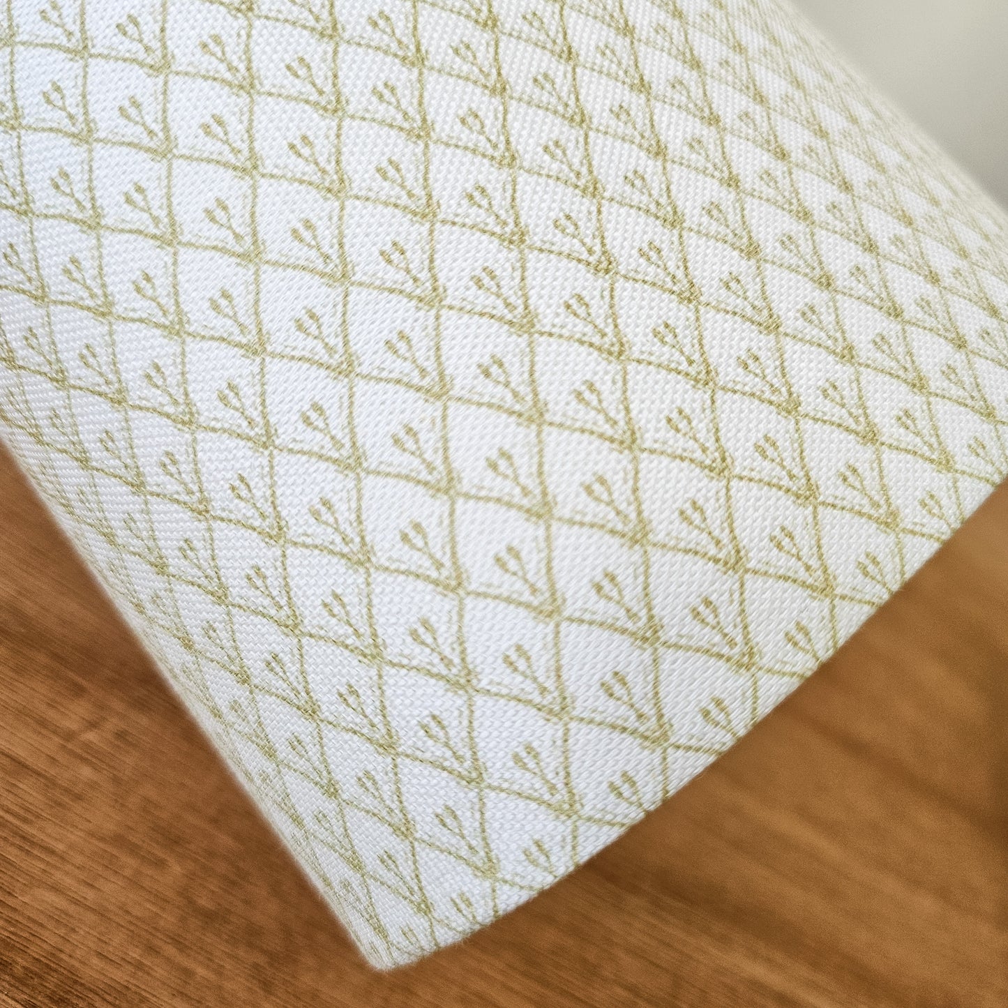 Rosemary fabric swatch in a trellis‑style cotton‑linen fabric by ZIA LIVING, featuring a repeating  lino‑print motif on a neutral background. Lampshade close up