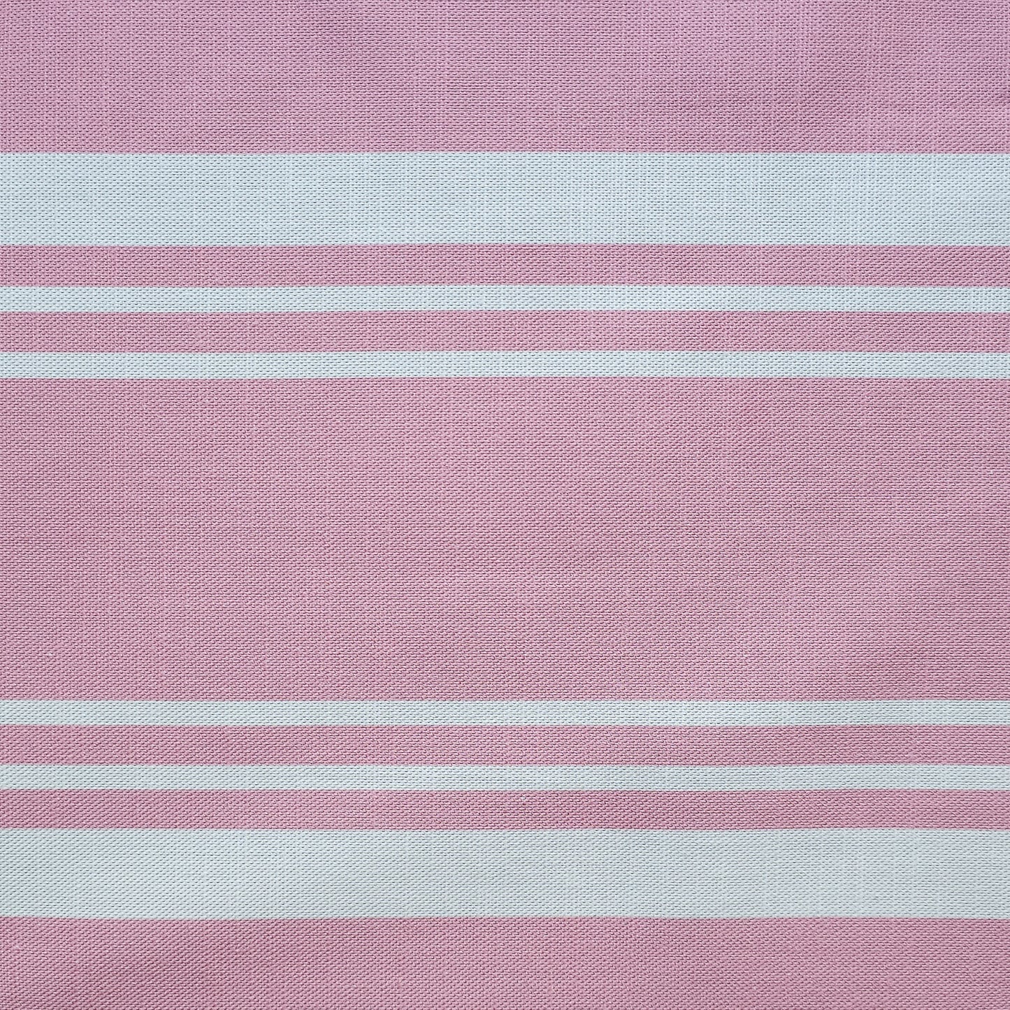Close‑up of Harbour Stripe fabric in soft Hydrangea pink and off‑white horizontal stripes, showing woven texture — ZIA LIVING.