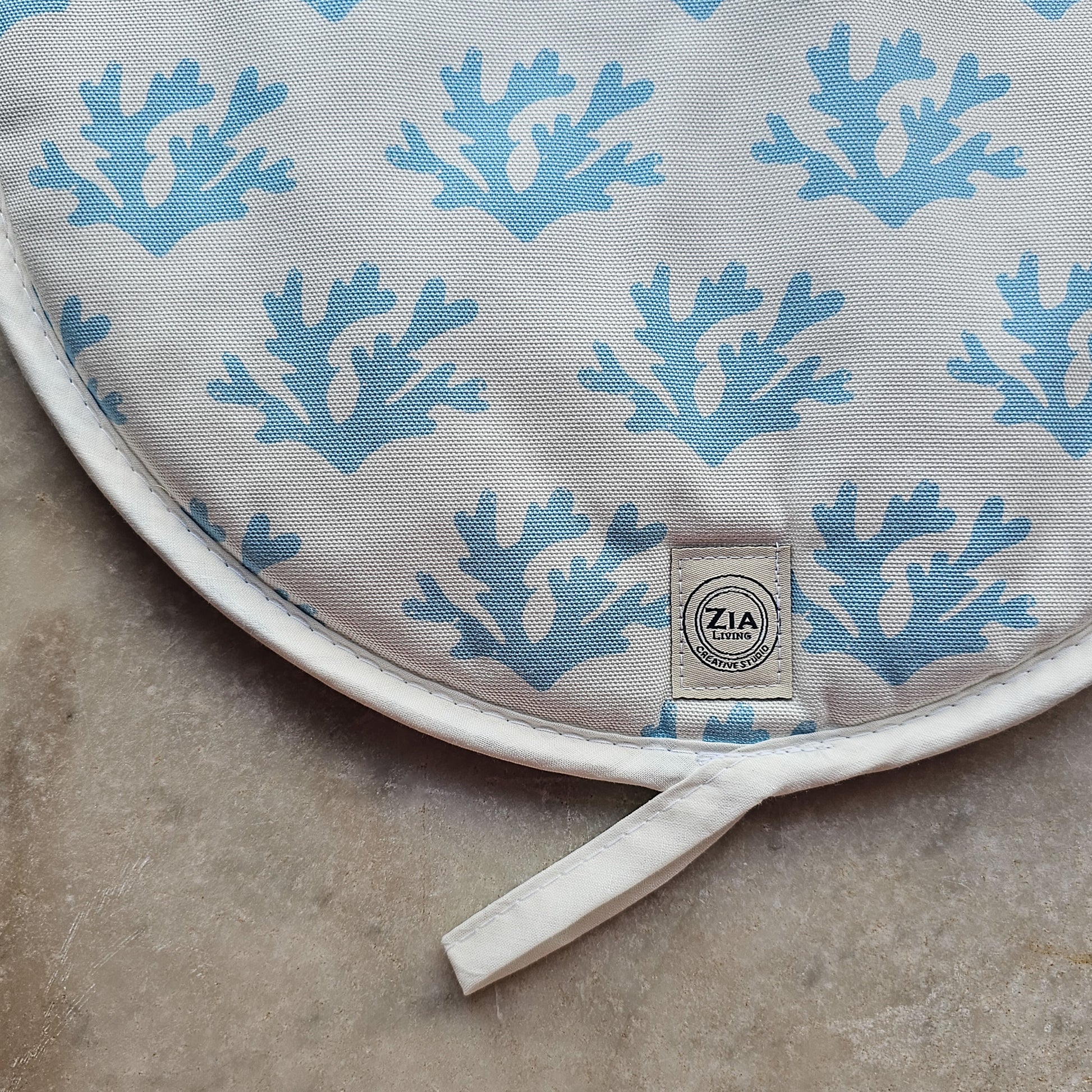Blue seaweed print Aga and hob pair of covers by ZIA LIVING, featuring a blue coral motif on white cotton base, shown close up