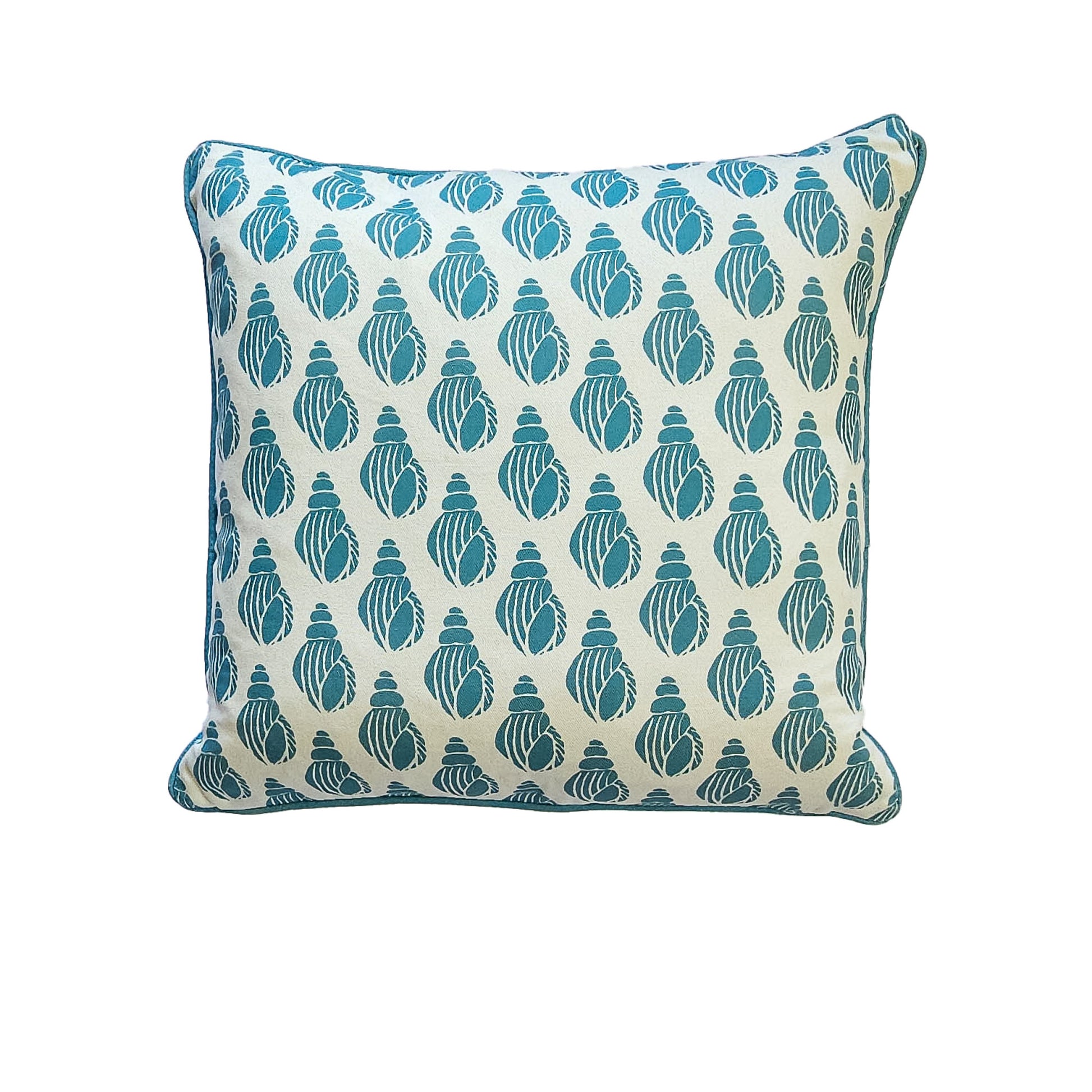 Sea Blue Shell cushion featuring a repeating hand‑carved shell motif in blue on a white background— ZIA LIVING.