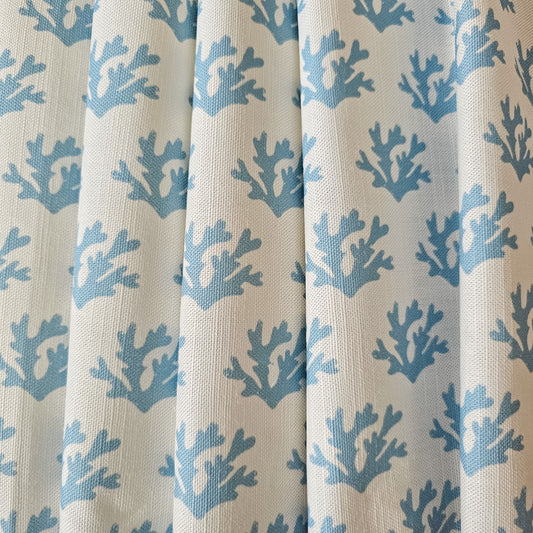 sky blue seaweed print draped fabric on white background by Zia Living