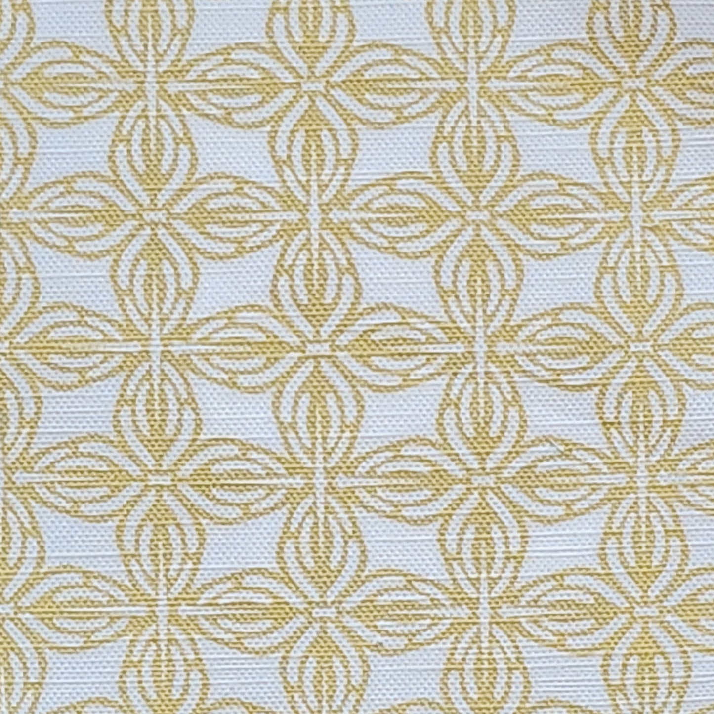 Bella cotton linen fabric swatch featuring a repeating yellow interlocking lino print motif on a soft white background. ZIA LIVING