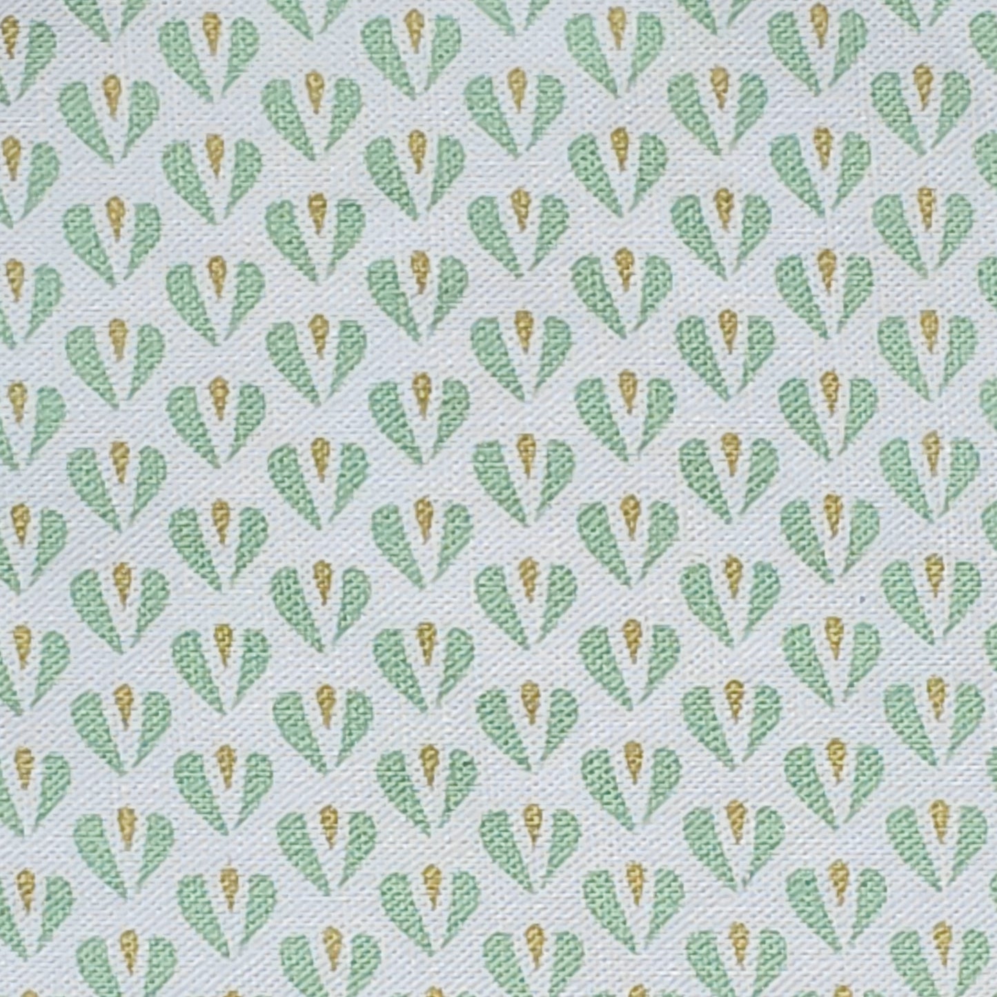 Carina, heart shaped motif in mint green and sand colours on neutral fabric, shown as fabric swatch, by Zia Living