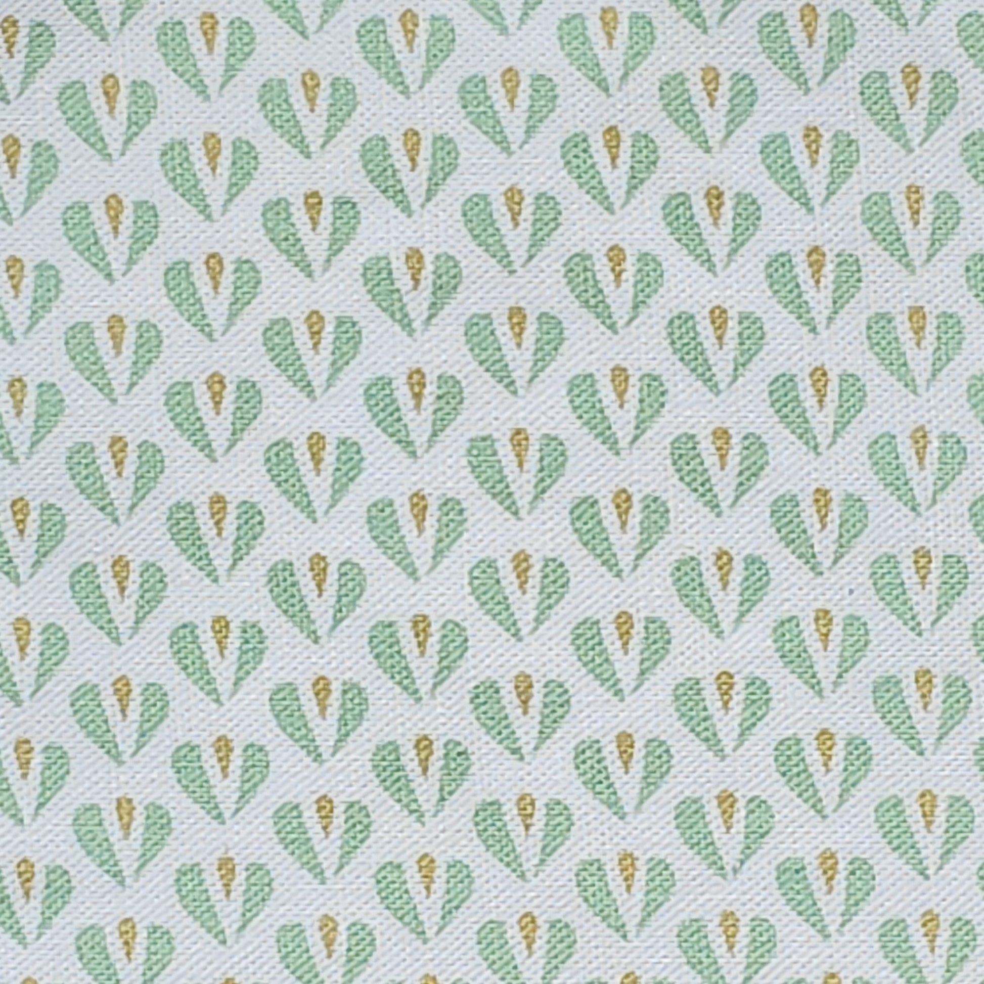 Carina, heart shaped motif in mint green and sand colours on neutral fabric, shown as fabric swatch, by Zia Living