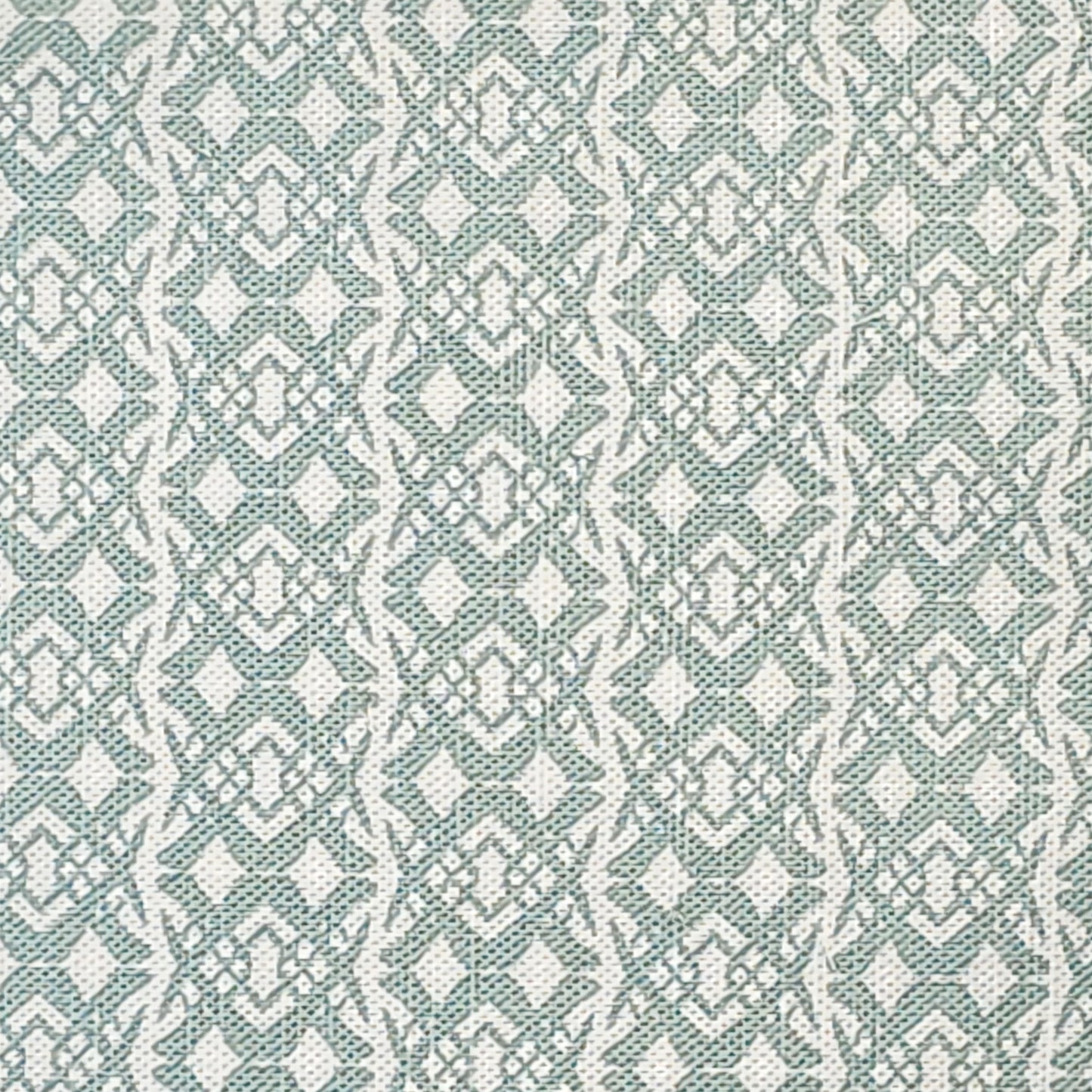 Fornet Classic cotton linen fabric swatch featuring a repeating pale blue interlocking curved motif on an off‑white background. ZIA LIVING