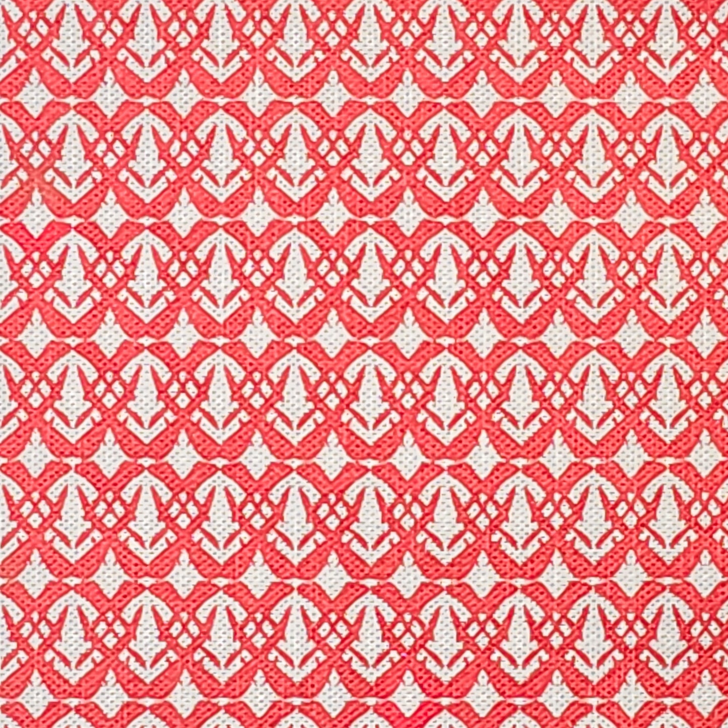 Fornet cotton linen fabric featuring a repeating raspberry  interlocking geometric motif on an off‑white background. ZIA LIVING.