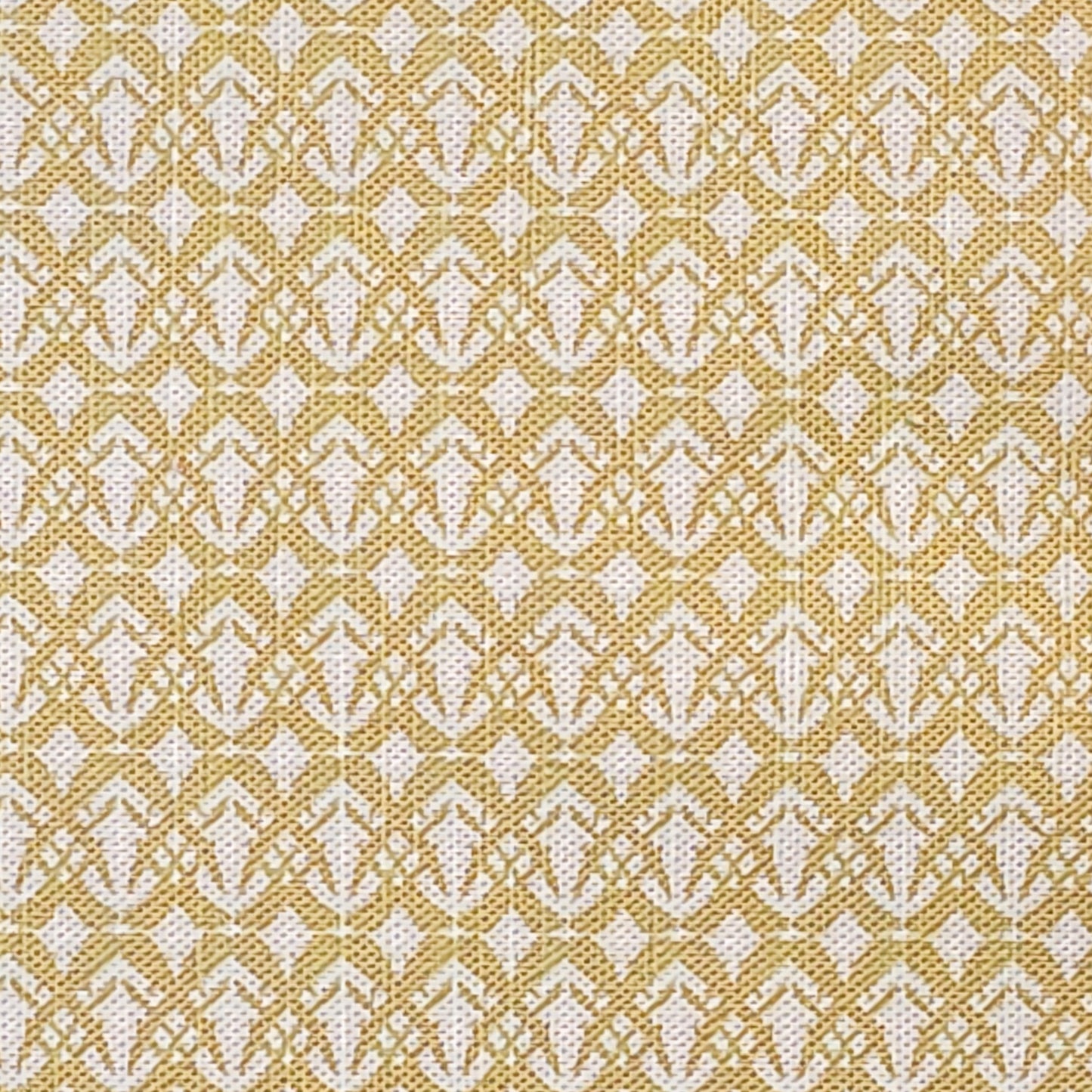 Fornet cotton linen fabric featuring a repeating sand interlocking geometric motif on an off‑white background. ZIA LIVING.