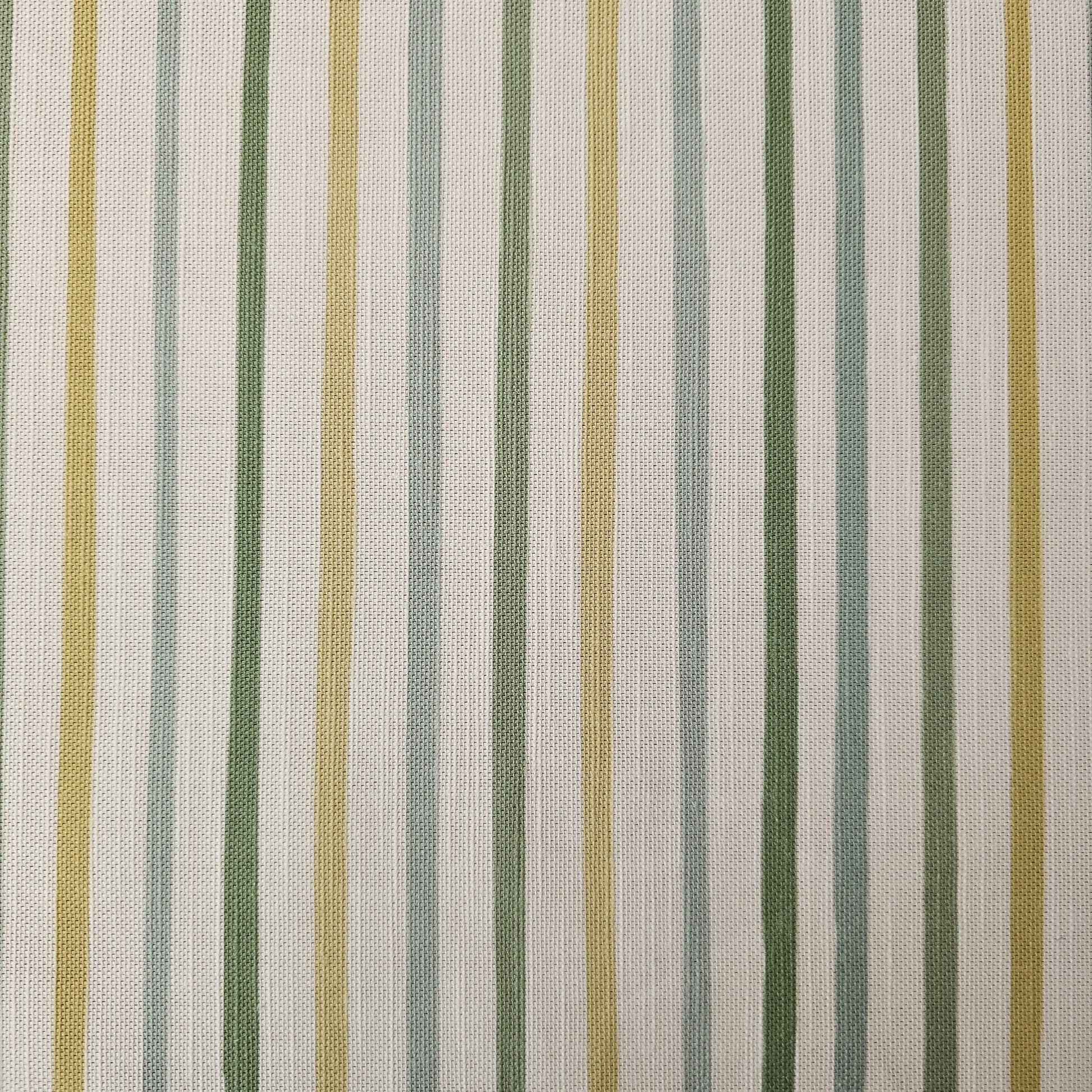 Zia Living fabric swatch in neutral green, yellow, strips