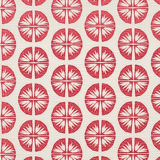 Pressed Flower cotton linen fabric featuring bold red circular floral motifs in a repeating pattern on an off‑white background. ZIA LIVING