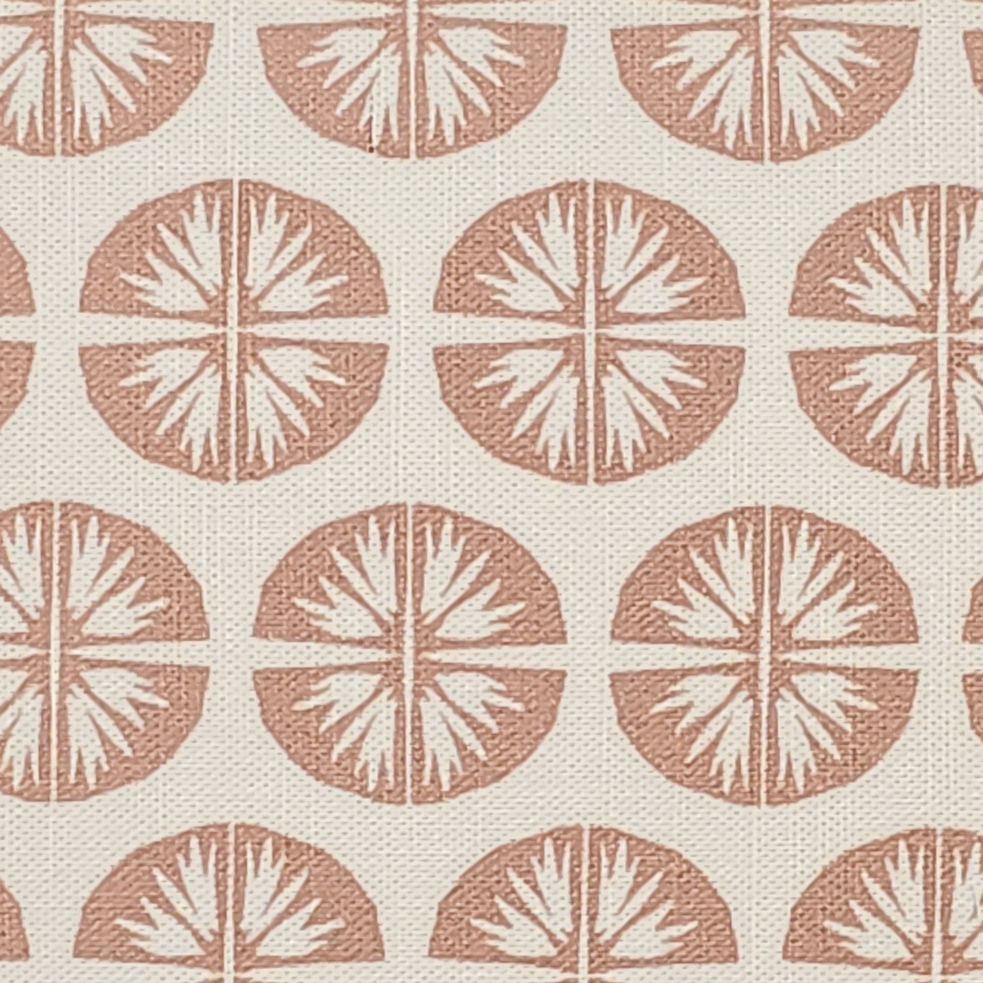 Pressed Flower cotton linen fabric featuring muted pink circular floral motifs in a repeating pattern on an off‑white background. ZIA LIVING