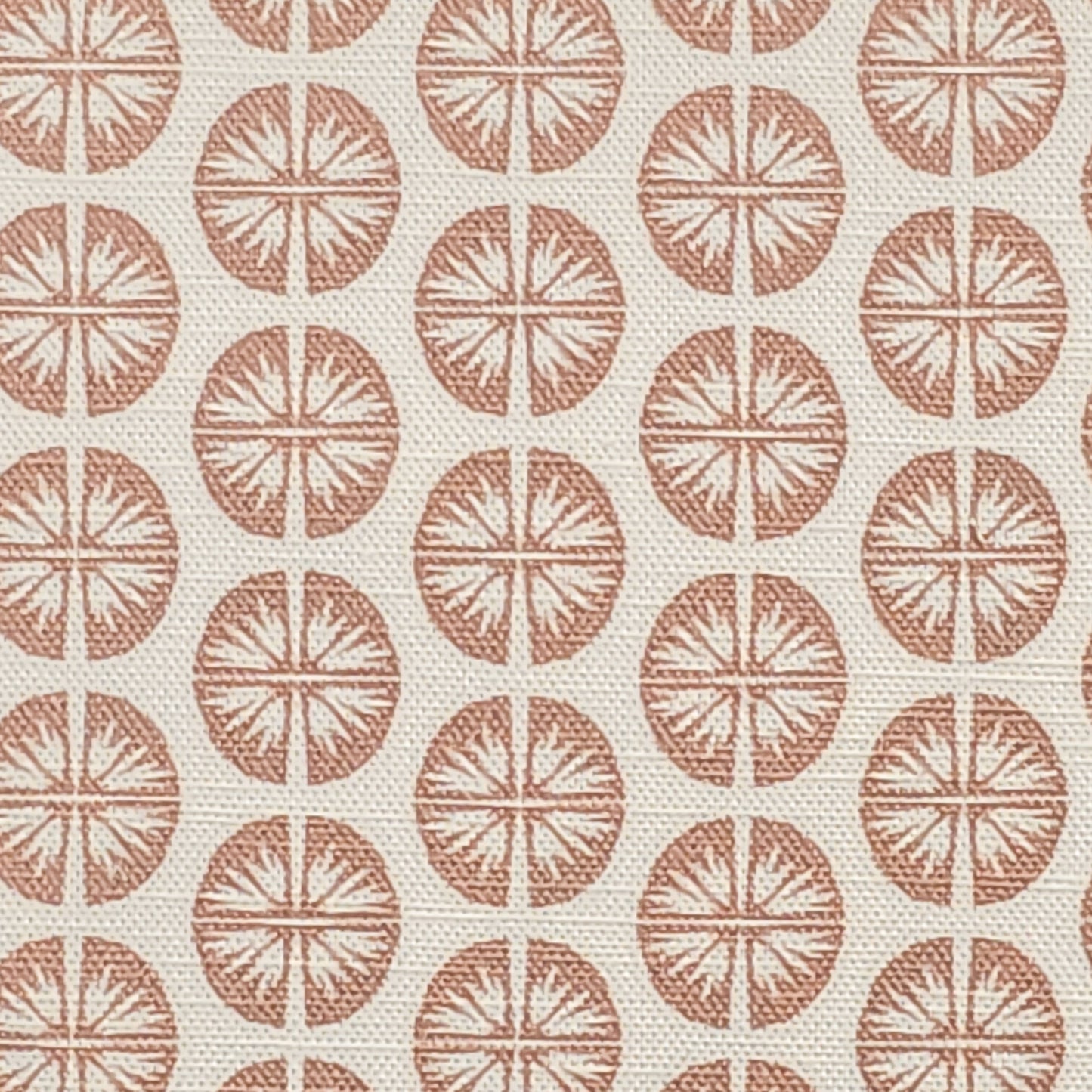 Pressed Flower cotton linen fabric featuring small muted pink circular floral motifs in a repeating pattern on an off‑white background. ZIA LIVING