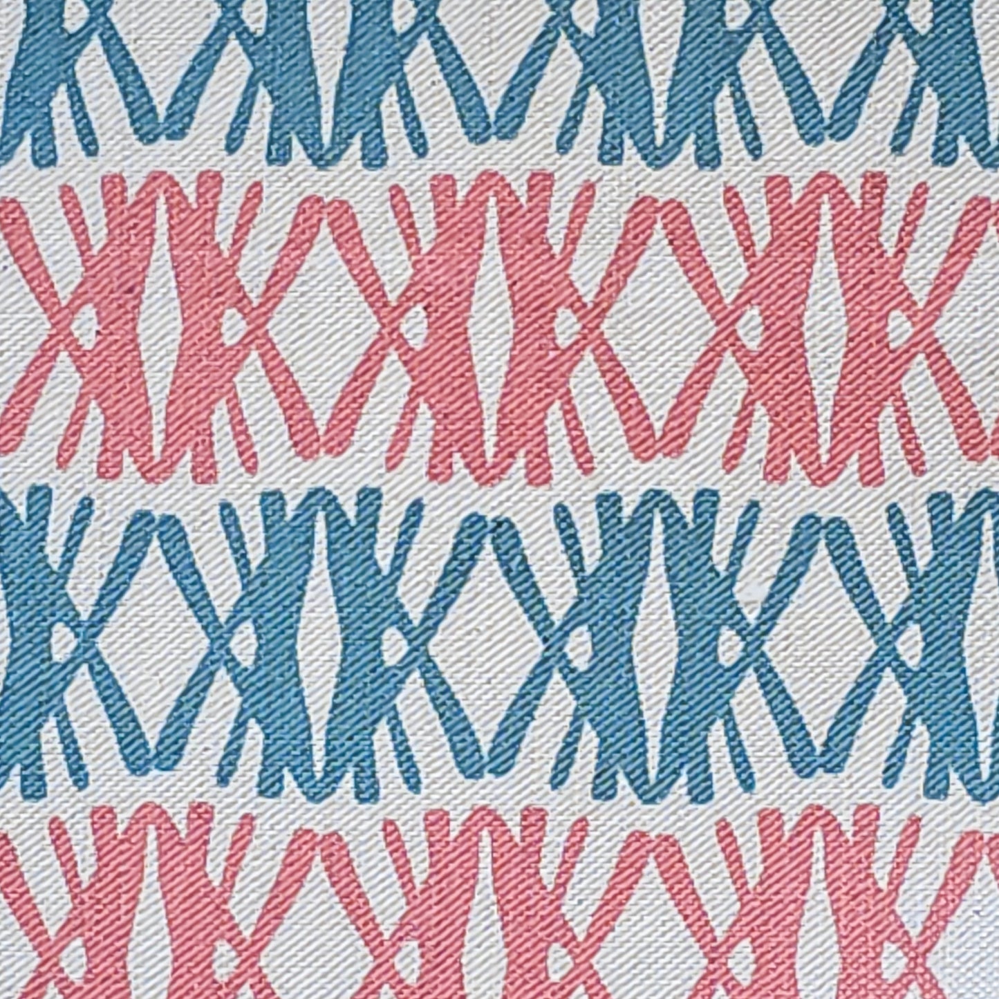 Fabric Swatch. Seagrass print scalloped lampshade by ZIA LIVING, featuring a blue and pink geometric lino‑print pattern on a natural cotton‑linen.