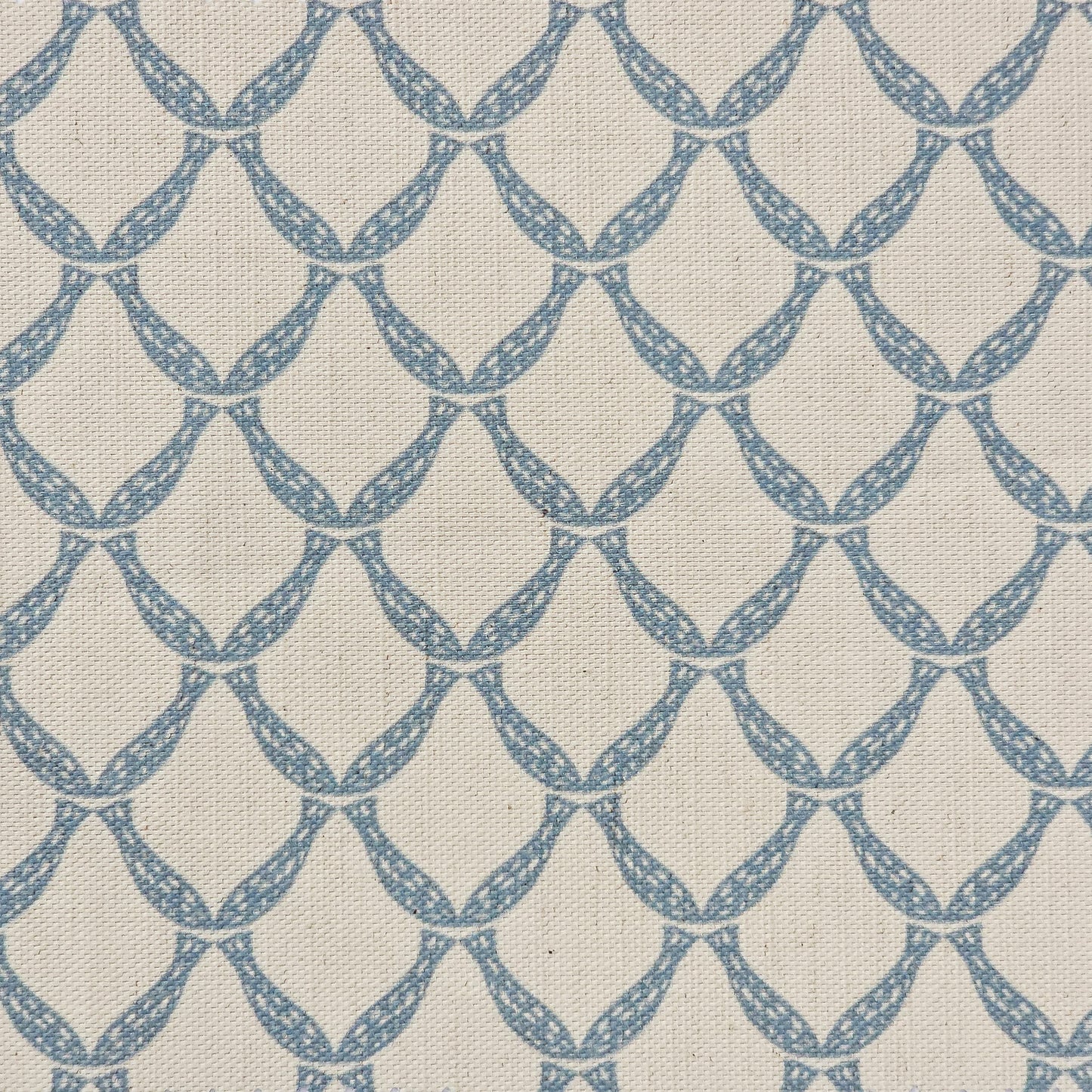 Marina cotton linen fabric featuring a repeating blue curved geometric trellis motif on an neutral textured background. ZIA LIVING.