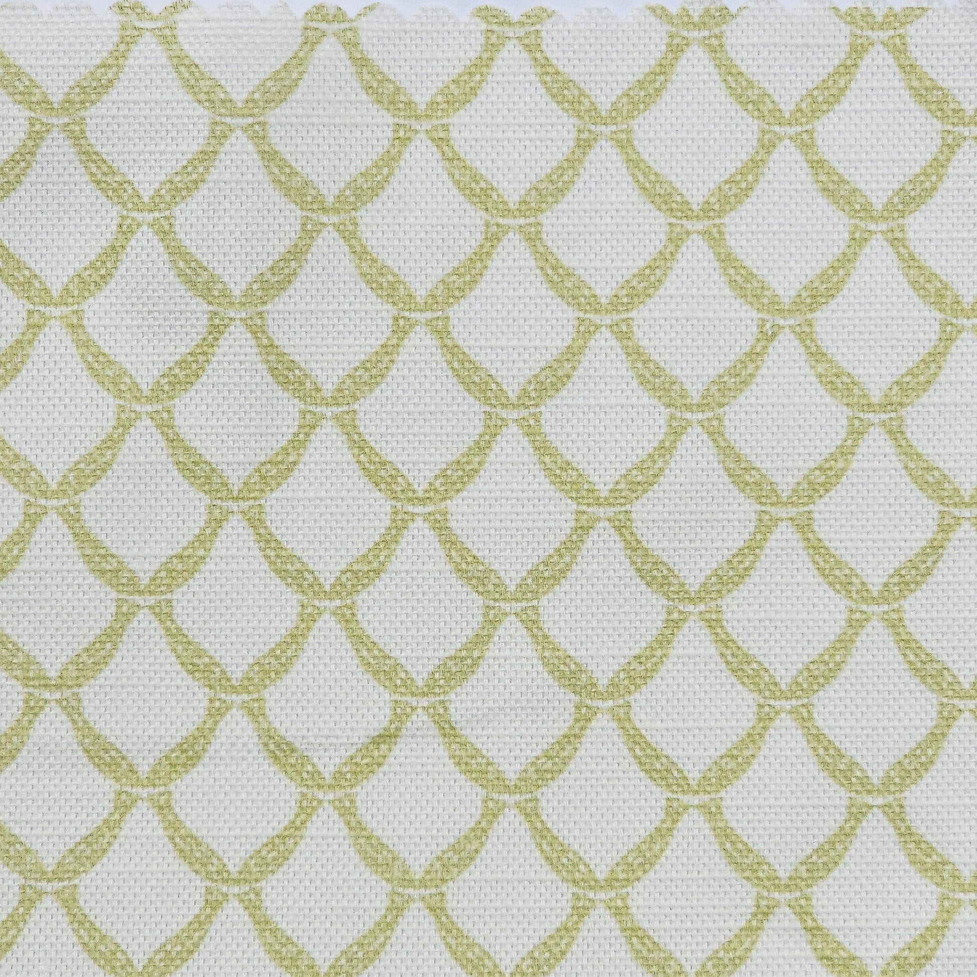 Marina cotton linen fabric featuring a repeating sand colour curved geometric trellis motif on an off‑white textured background. ZIA LIVING.