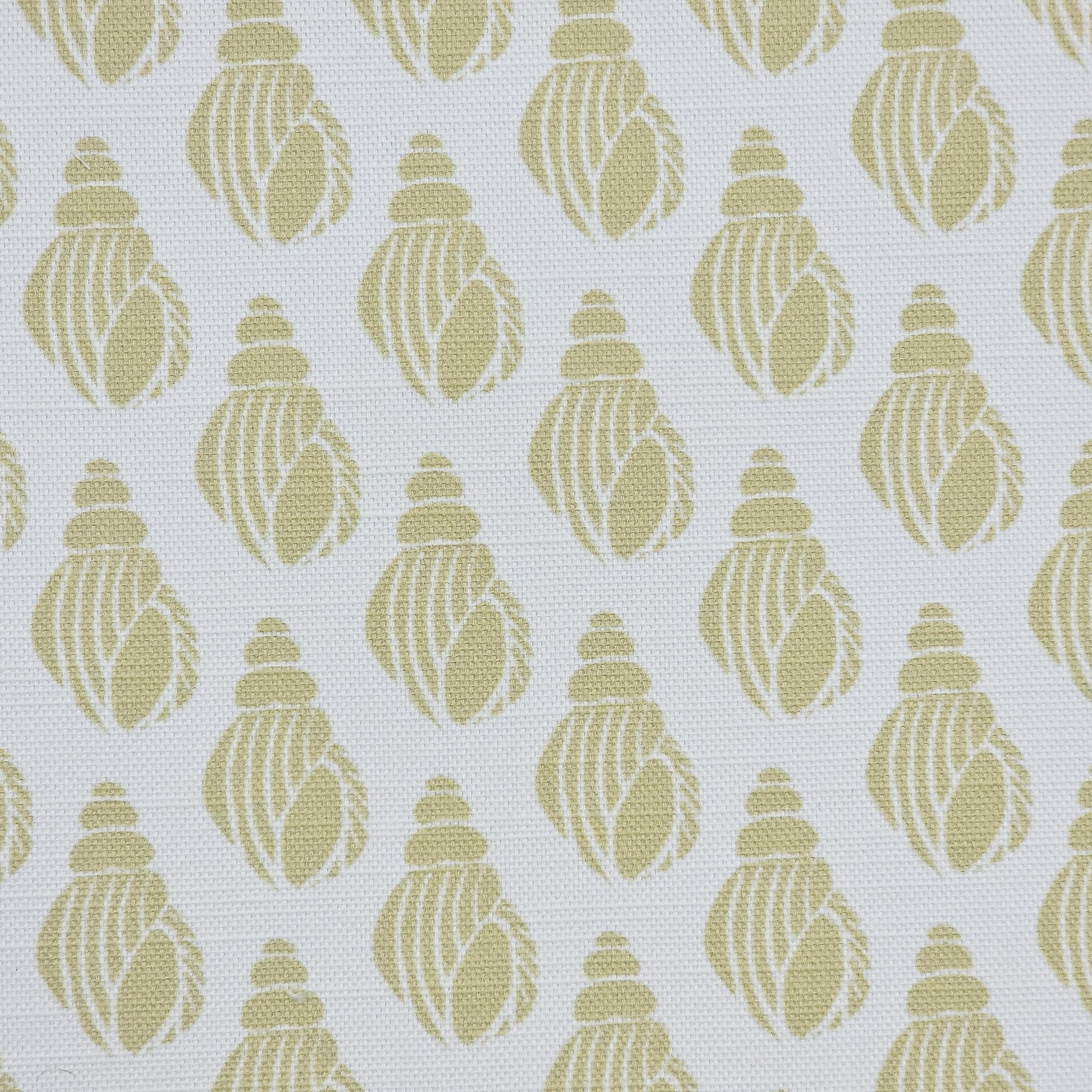 Shell lino print design cotton linen fabric featuring shell motifs in soft sand colour on an off‑white background. ZIA LIVING