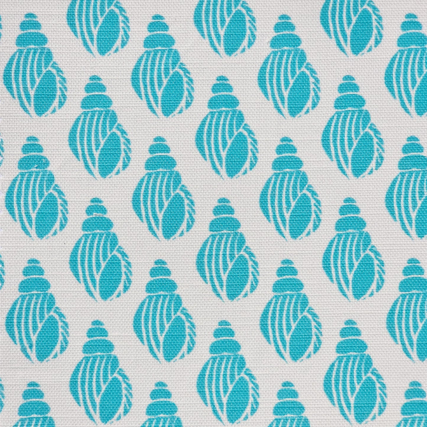 Shell lino print design cotton linen fabric featuring shell motifs in soft teal on an off‑white background. ZIA LIVING