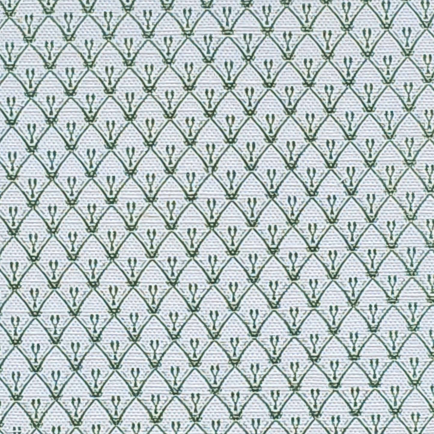 Rosemary fabric swatch in a trellis‑style cotton‑linen fabric by ZIA LIVING, in green featuring a repeating  lino‑print motif on a neutral background.