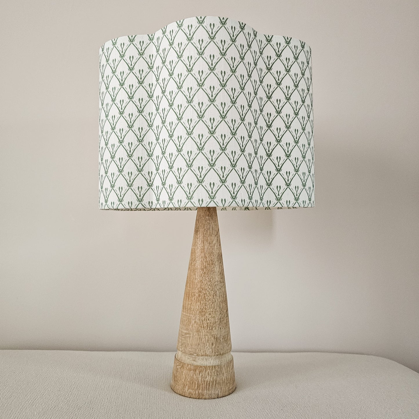Rosemary Classic cotton‑linen fabric with a white background and green coloured repeat featured on a lampshade — ZIA LIVING.