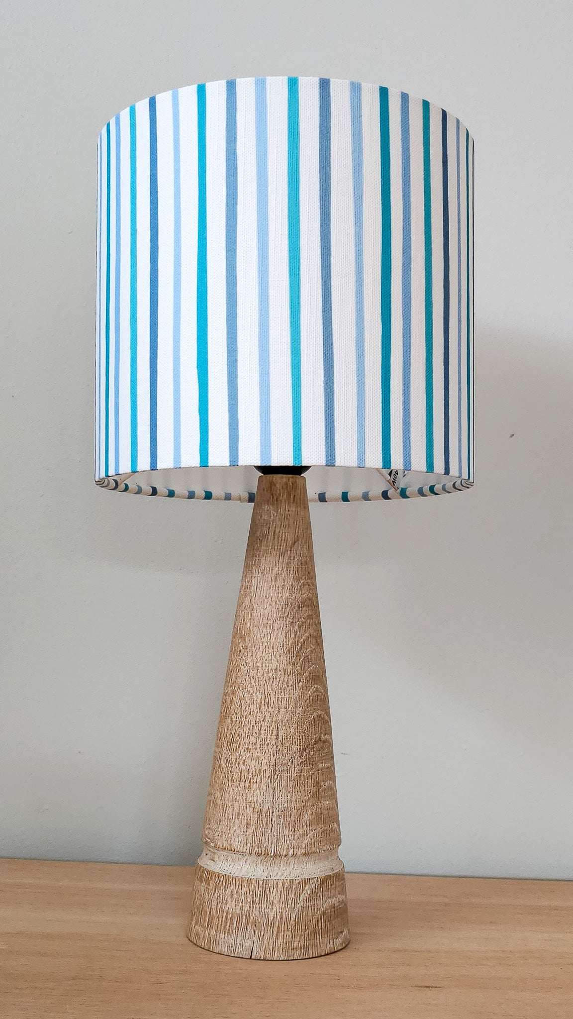 Blue and white striped drum lampshade on wooden base — ZIA LIVING