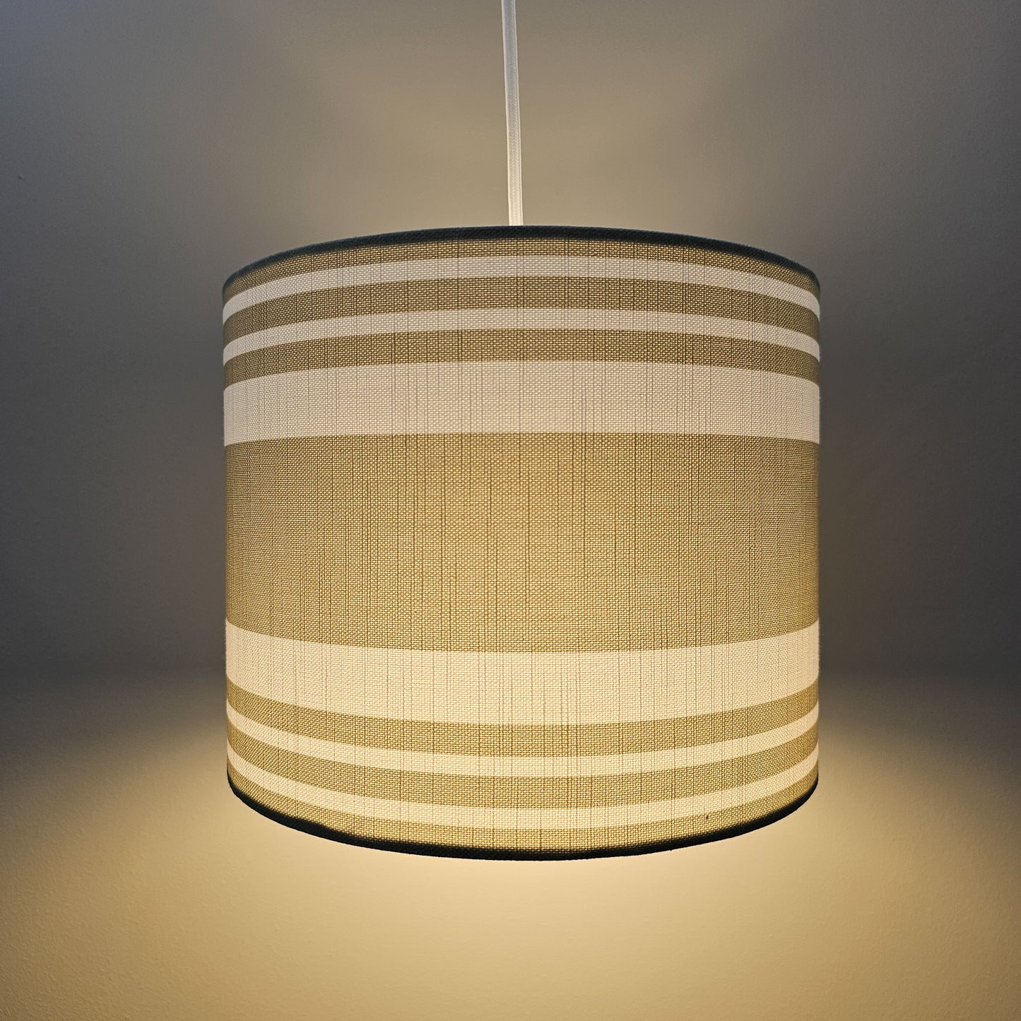 Handmade drum lampshade in Harbour Stripe fabric on neutral background — artisan home décor by ZIA LIVING.
