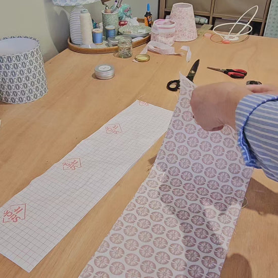 video of me making the oval lampshade in pressed flower fabric in pink 
