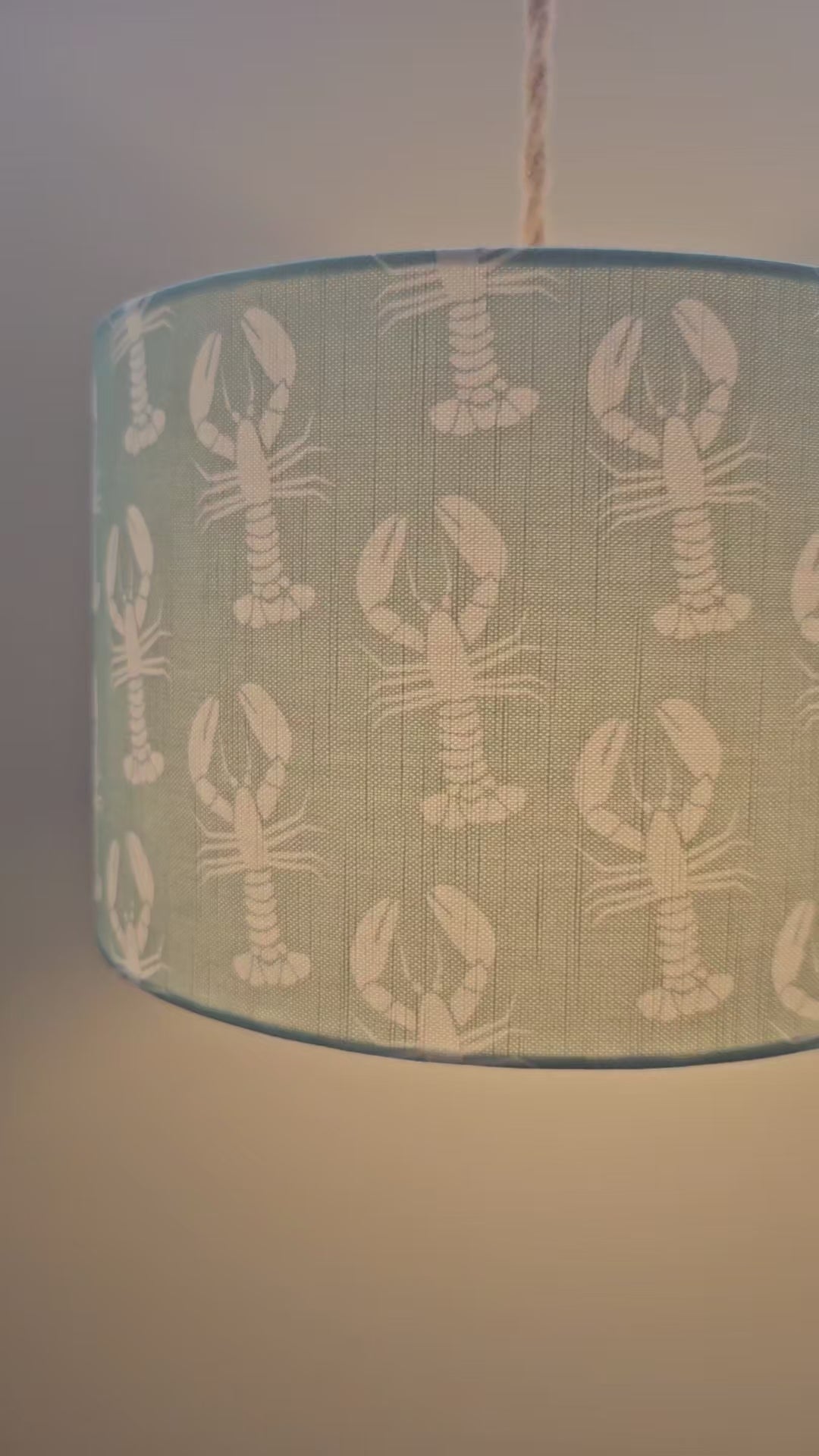 reel of me making a drum lampshade in lobster print fabrc