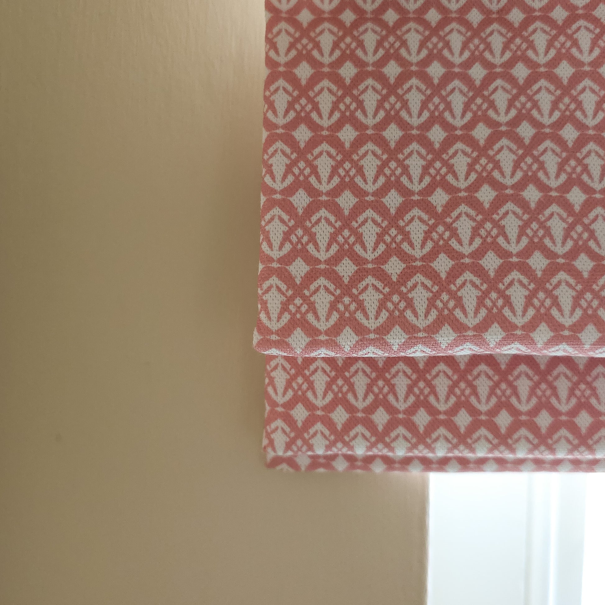 roman blind featuring the fornet print in a custom coloured pink print. Zia Living